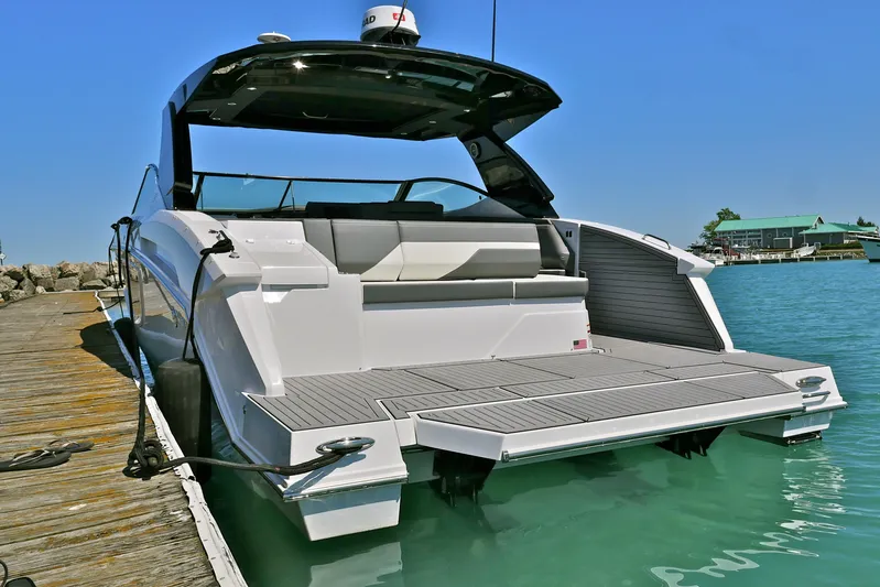  Yacht Photos Pics 2026 Cruisers Yachts 38 GLS I/O docked, showcasing sleek design and spacious deck.