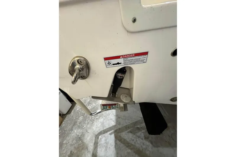  Yacht Photos Pics Close-up of 2023 Sea Fox 328 Commander boat's stern with warning label.