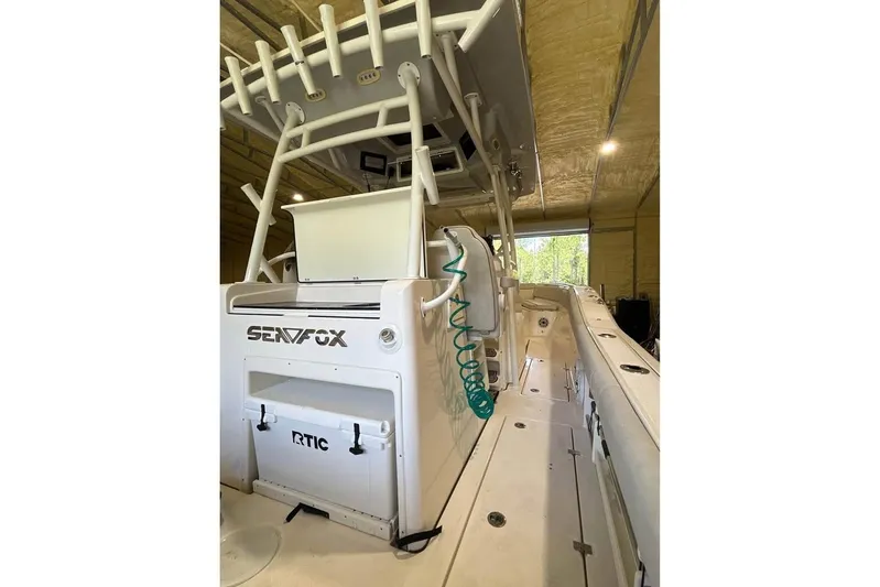  Yacht Photos Pics 2023 Sea Fox 328 Commander boat interior with storage and seating features.
