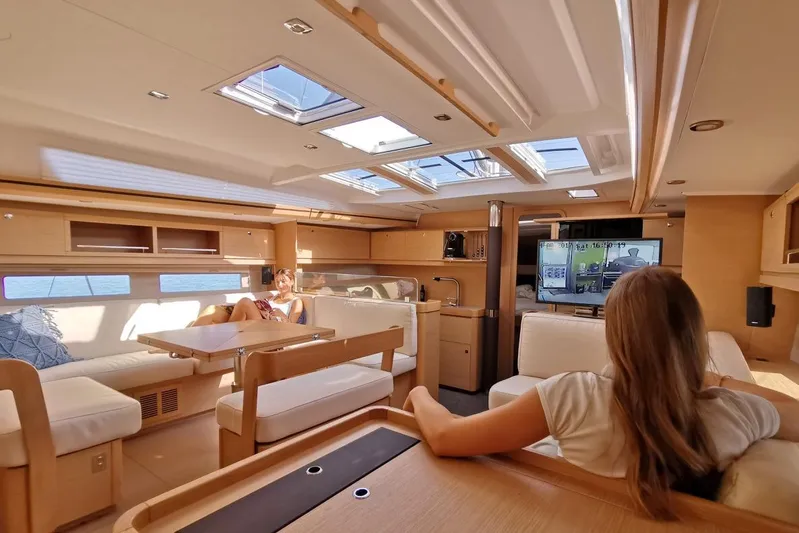  Yacht Photos Pics Luxurious interior of 2020 Dufour 56 Exclusive yacht with modern furnishings and natural light.