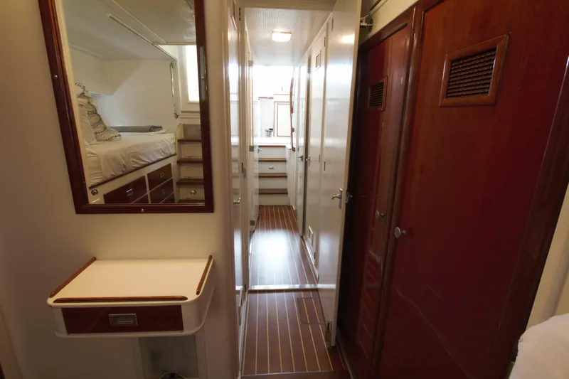  Yacht Photos Pics 1963 Huckins Linwood yacht interior with wood paneling and cozy cabin space.