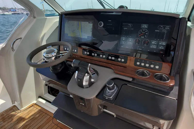 Pouge Life Yacht Photos Pics Helm of 2021 Tiara Sport 38 LS with advanced navigation controls and display.