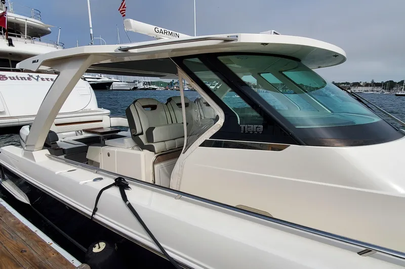 Pouge Life Yacht Photos Pics 2021 Tiara Sport 38 LS luxury boat docked at marina with sleek design.