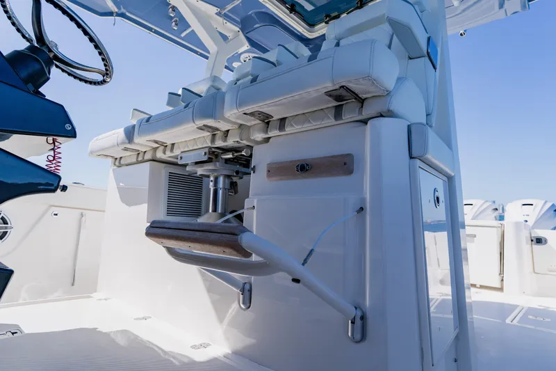 Blue Skies Yacht Photos Pics 2022 Pursuit S 378 Sport boat interior with helm and seating area.