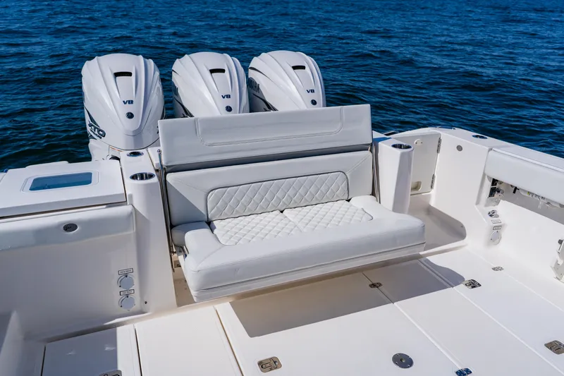 Blue Skies Yacht Photos Pics 2022 Pursuit S 378 Sport boat with triple V8 engines and luxurious seating.