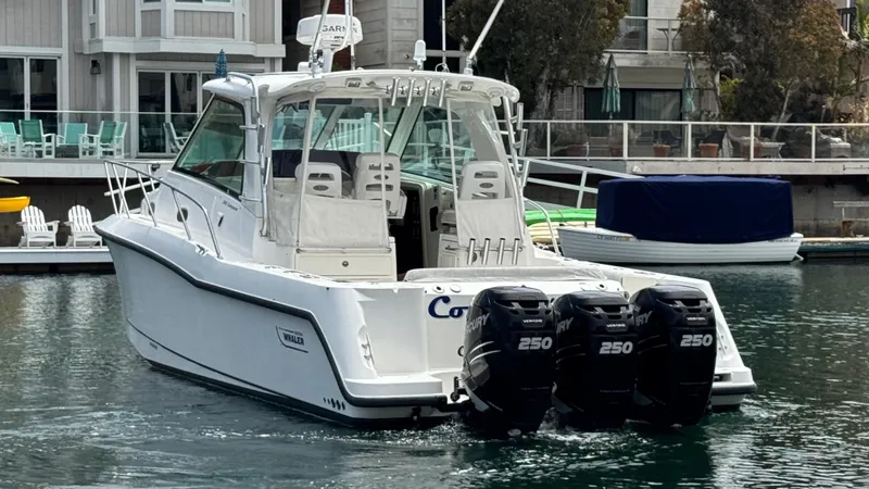  Yacht Photos Pics 2008 Boston Whaler 345 Conquest boat with triple Mercury 250 engines docked in marina.
