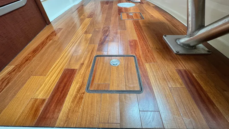  Yacht Photos Pics Polished wooden floor of 2008 Boston Whaler 345 Conquest boat interior.