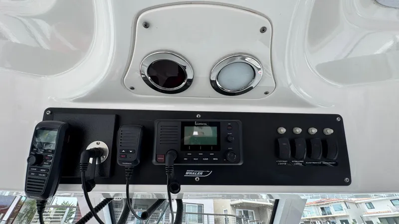  Yacht Photos Pics Control panel of a 2008 Boston Whaler 345 Conquest boat with communication devices.