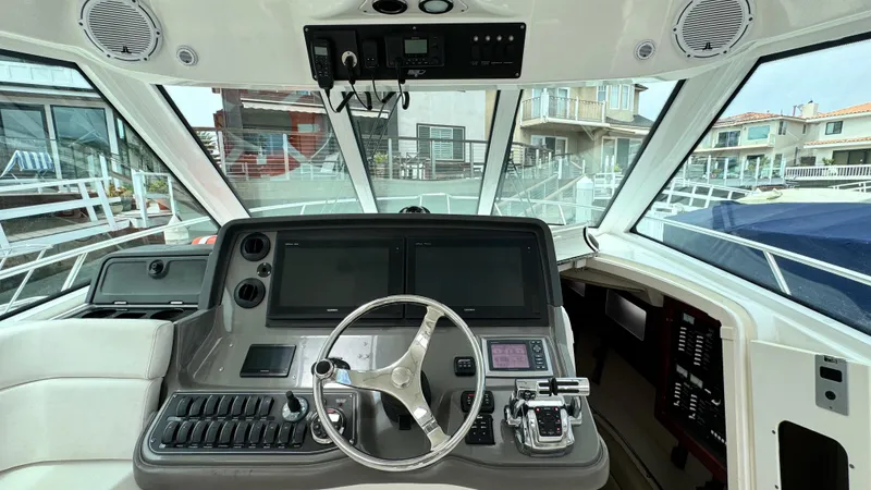  Yacht Photos Pics 2008 Boston Whaler 345 Conquest helm with modern controls and navigation screens.