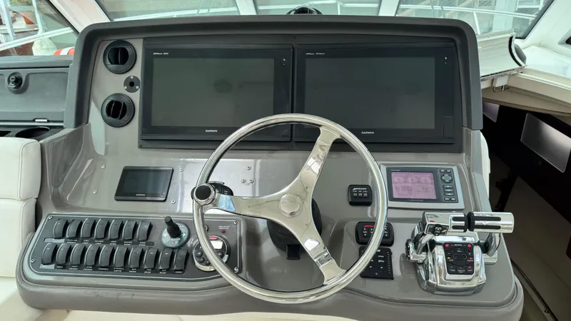  Yacht Photos Pics 2008 Boston Whaler 345 Conquest helm with dual Garmin displays and modern controls.