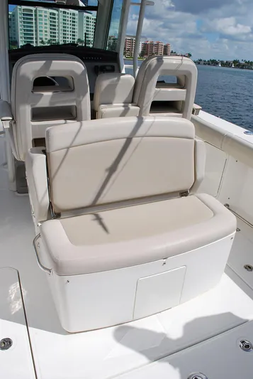  Yacht Photos Pics 2017 Boston Whaler 330 Outrage boat seating with ocean view and modern design.