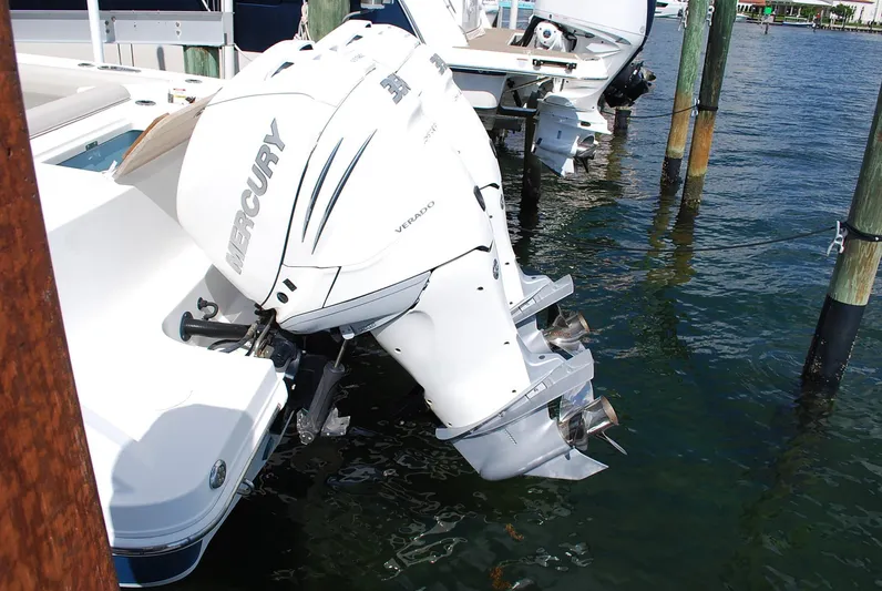  Yacht Photos Pics 2017 Boston Whaler 330 Outrage with Mercury Verado outboard engines docked in marina.