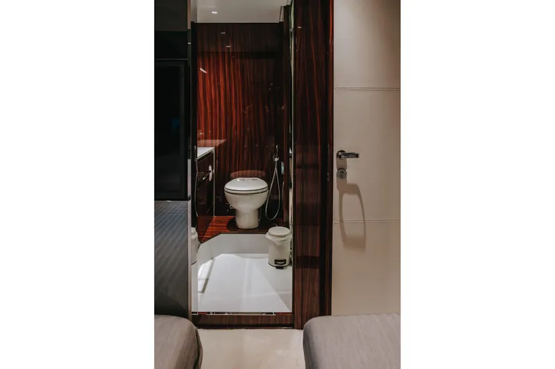  Yacht Photos Pics Luxurious bathroom interior on 2022 Riva 82' Diva yacht, featuring modern design elements.