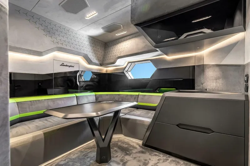  Yacht Photos Pics Luxurious interior of 2026 Tecnomar 63 yacht with modern seating and sleek design.