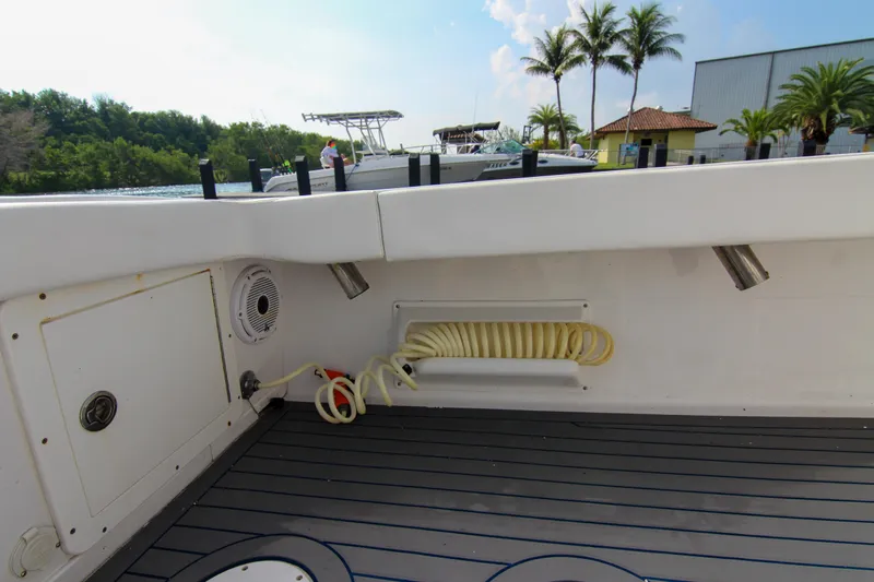  Yacht Photos Pics Interior view of a 1996 Ocean Master 31 Center Console boat with hose storage.
