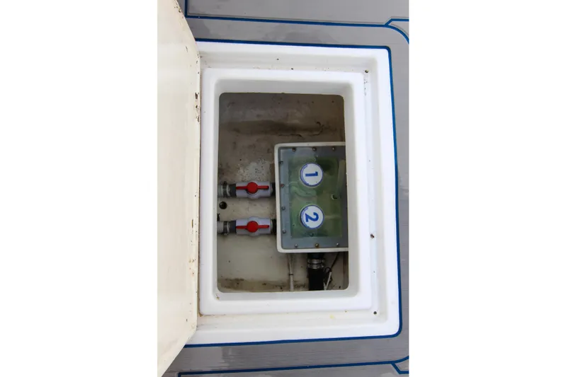  Yacht Photos Pics Hatch interior of 1996 Ocean Master 31 Center Console with numbered valves.