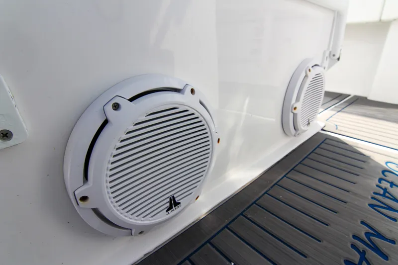  Yacht Photos Pics White speakers on a 1996 Ocean Master 31 Center Console boat deck.