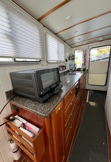 Idaho Red Yacht Photos Pics Interior of 2018 Great Harbour TT35 boat with kitchen area and appliances.