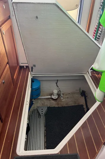 Idaho Red Yacht Photos Pics Open hatch on 2018 Great Harbour TT35 boat, revealing storage compartment.