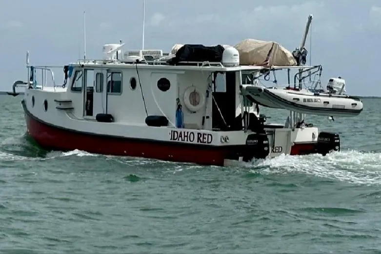 Idaho Red Yacht Photos Pics 2018 Great Harbour TT35 boat "Idaho Red" cruising on the water.