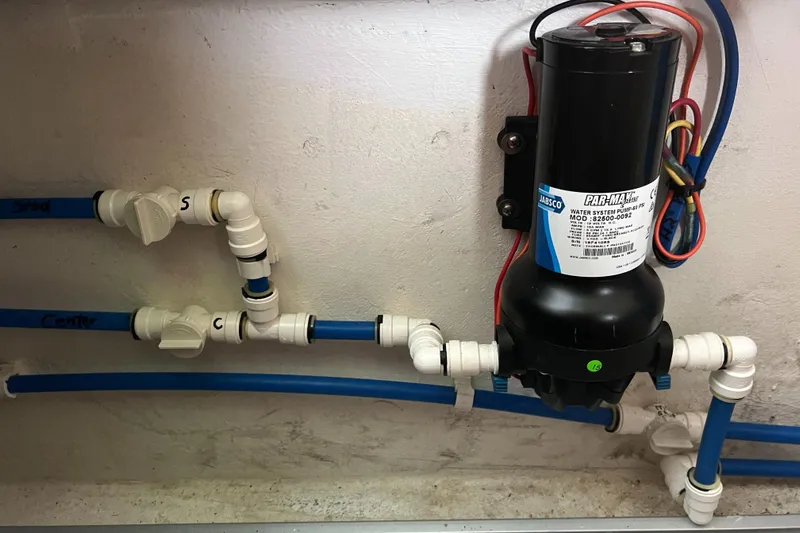 Idaho Red Yacht Photos Pics Plumbing system with pump and blue pipes in a 2018 Great Harbour TT35 boat.