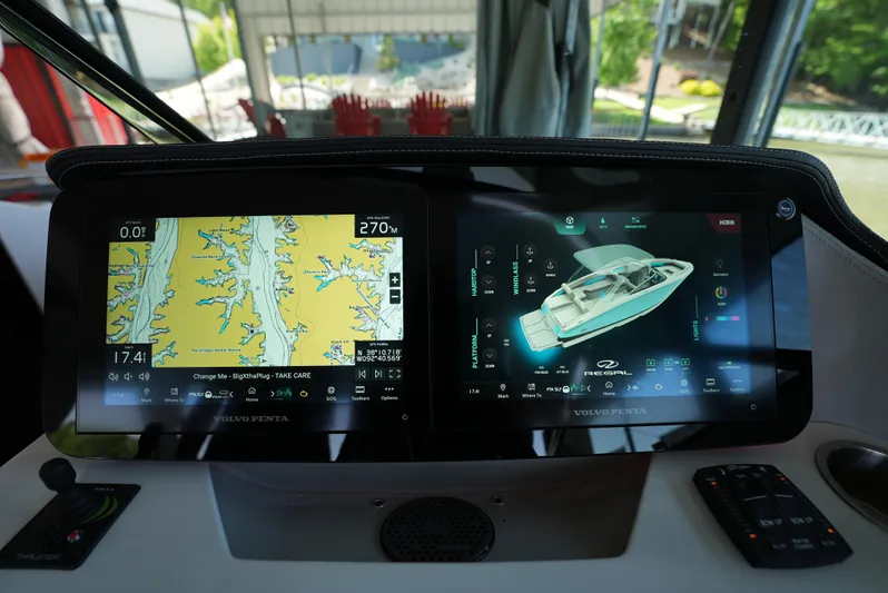  Yacht Photos Pics Dashboard of 2025 Regal LS9 boat with navigation and control screens.
