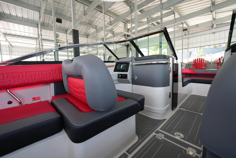 Yacht Photos Pics Interior of 2025 Regal LS9 boat with red and gray seating, modern design.