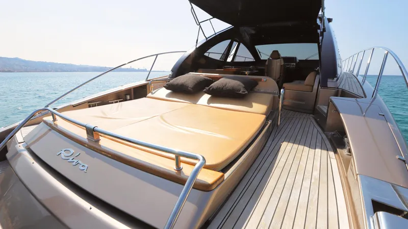 W Yacht Photos Pics Luxurious 2009 Riva 63 Vertigo yacht with spacious sun deck and elegant design.