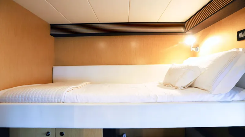 W Yacht Photos Pics Luxurious cabin bed in 2009 Riva 63 Vertigo yacht interior.