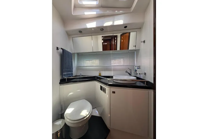  Yacht Photos Pics Luxurious bathroom in 2012 Elan 48 Power yacht with modern fixtures and sleek design.