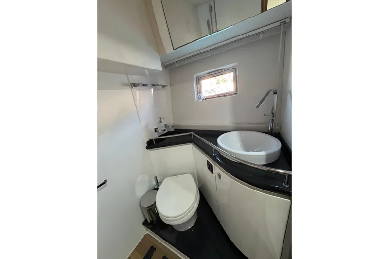  Yacht Photos Pics Modern bathroom in 2012 Elan 48 Power yacht with sleek fixtures and compact design.