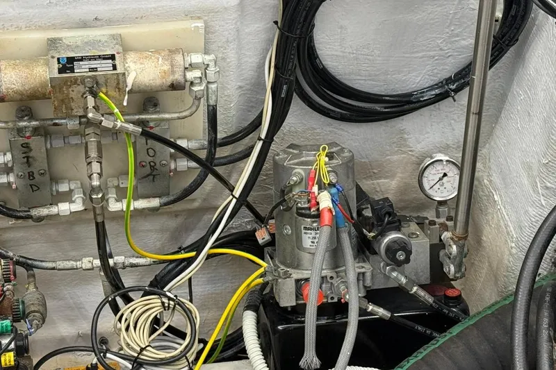  Yacht Photos Pics Engine room of 2012 Elan 48 Power boat with hydraulic and electrical components.