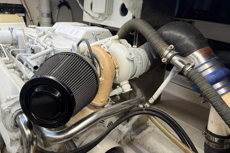  Yacht Photos Pics Engine compartment of 2012 Elan 48 Power boat, showcasing detailed mechanical components.