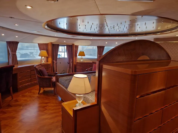  Yacht Photos Pics Luxurious interior of 2010 Benetti Vision 145 yacht with elegant wood furnishings and ambient lighting.