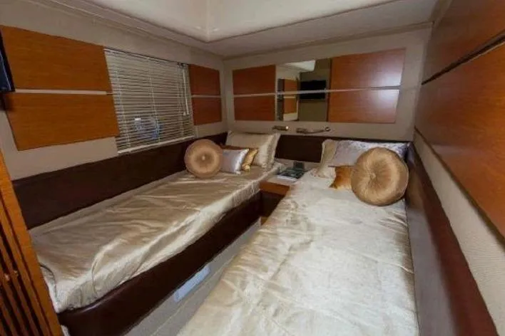 53 Flybridge Yacht Photos Pics Luxurious twin cabin interior of 2012 Azimut 53 Flybridge yacht with elegant decor.