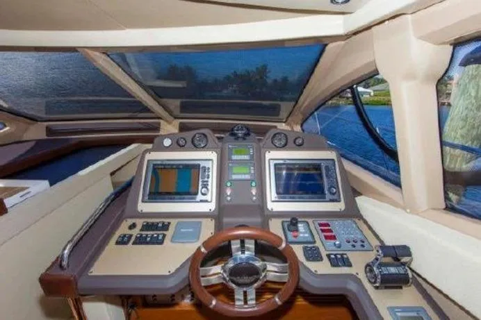 53 Flybridge Yacht Photos Pics Cockpit of 2012 Azimut 53 Flybridge yacht with advanced navigation systems and controls.
