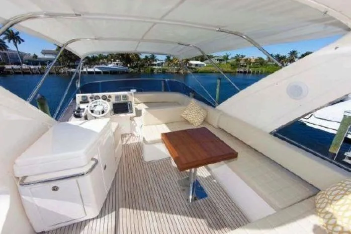 53 Flybridge Yacht Photos Pics Luxurious 2012 Azimut 53 Flybridge yacht with spacious seating and scenic water views.