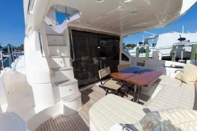 53 Flybridge Yacht Photos Pics Luxurious 2012 Azimut 53 Flybridge yacht with spacious outdoor seating and elegant design.