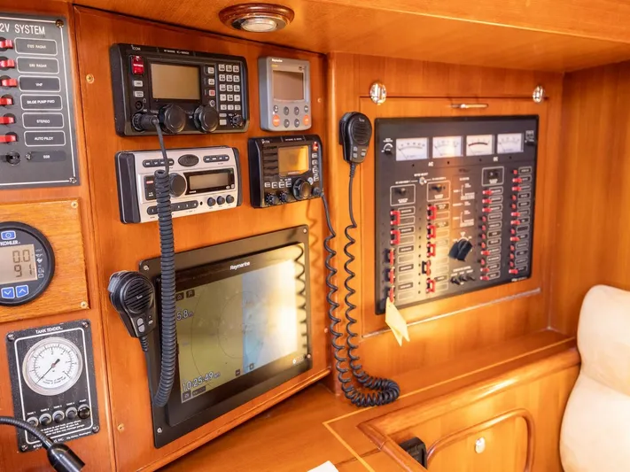 Tutkum Yacht Photos Pics Navigation and communication equipment on a 2007 Tayana 48 yacht control panel.