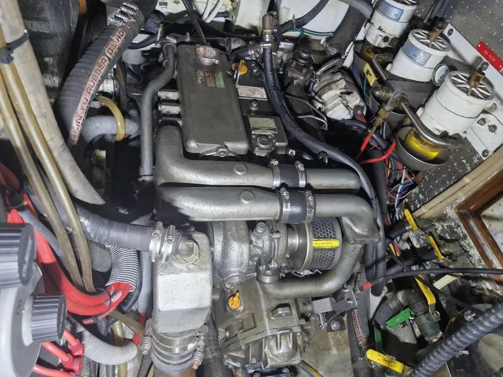 Tutkum Yacht Photos Pics Engine compartment of a 2007 Tayana 48 sailboat, showcasing detailed mechanical components.