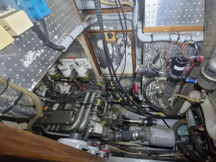 Tutkum Yacht Photos Pics Engine room of 2007 Tayana 48 yacht, showcasing complex mechanical systems and wiring.