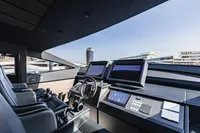Interior cockpit of 2021 Pershing 8X yacht with modern navigation systems.