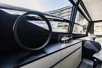 Interior of 2021 Pershing 8X yacht with modern decor and model display.