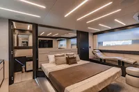 Luxurious interior of 2021 Pershing 8X yacht with modern bedroom design.