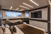 Luxurious interior of 2021 Pershing 8X yacht with modern design and elegant furnishings.