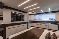 Luxurious interior of 2021 Pershing 8X yacht with modern design and elegant furnishings.