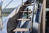 Staircase on 2021 Pershing 8X yacht with sleek design and modern finish.