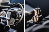 Steering wheel and throttle controls of 2021 Pershing 8X yacht, showcasing luxury design.