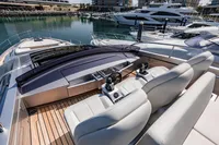 Luxury Pershing 8X yacht helm with modern controls, docked in marina, 2021 model.