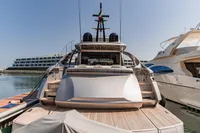 Luxury Pershing 8X yacht, 2021 model, docked at marina with modern design.